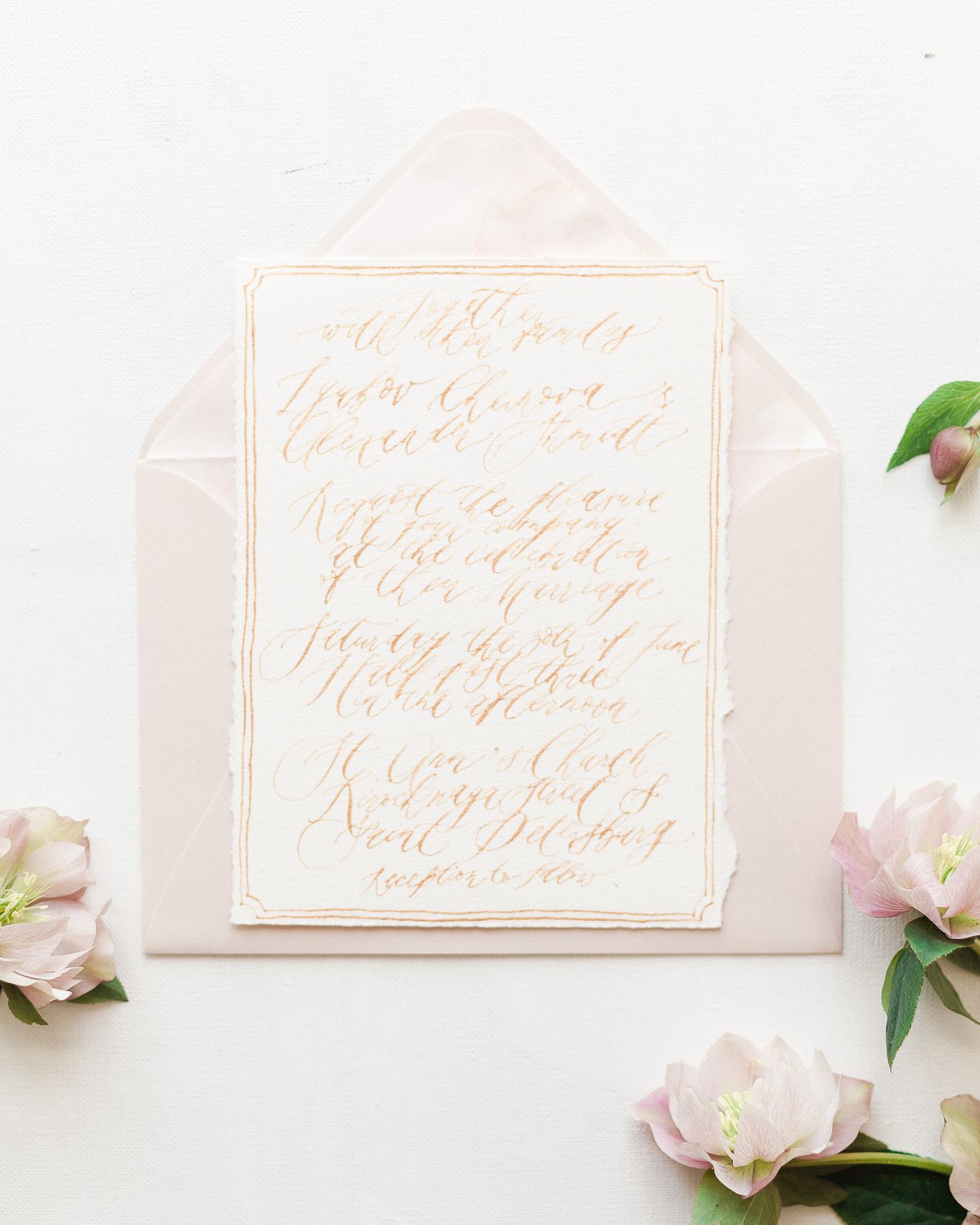 White invitation with building sketch