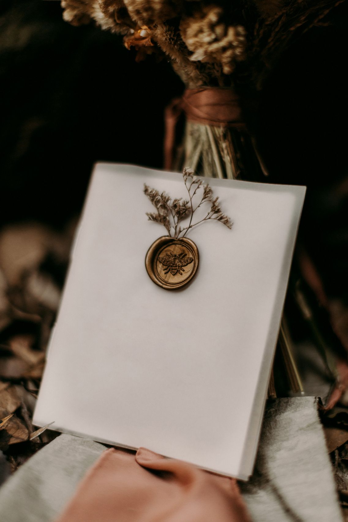 Black invitation with gold floral foil