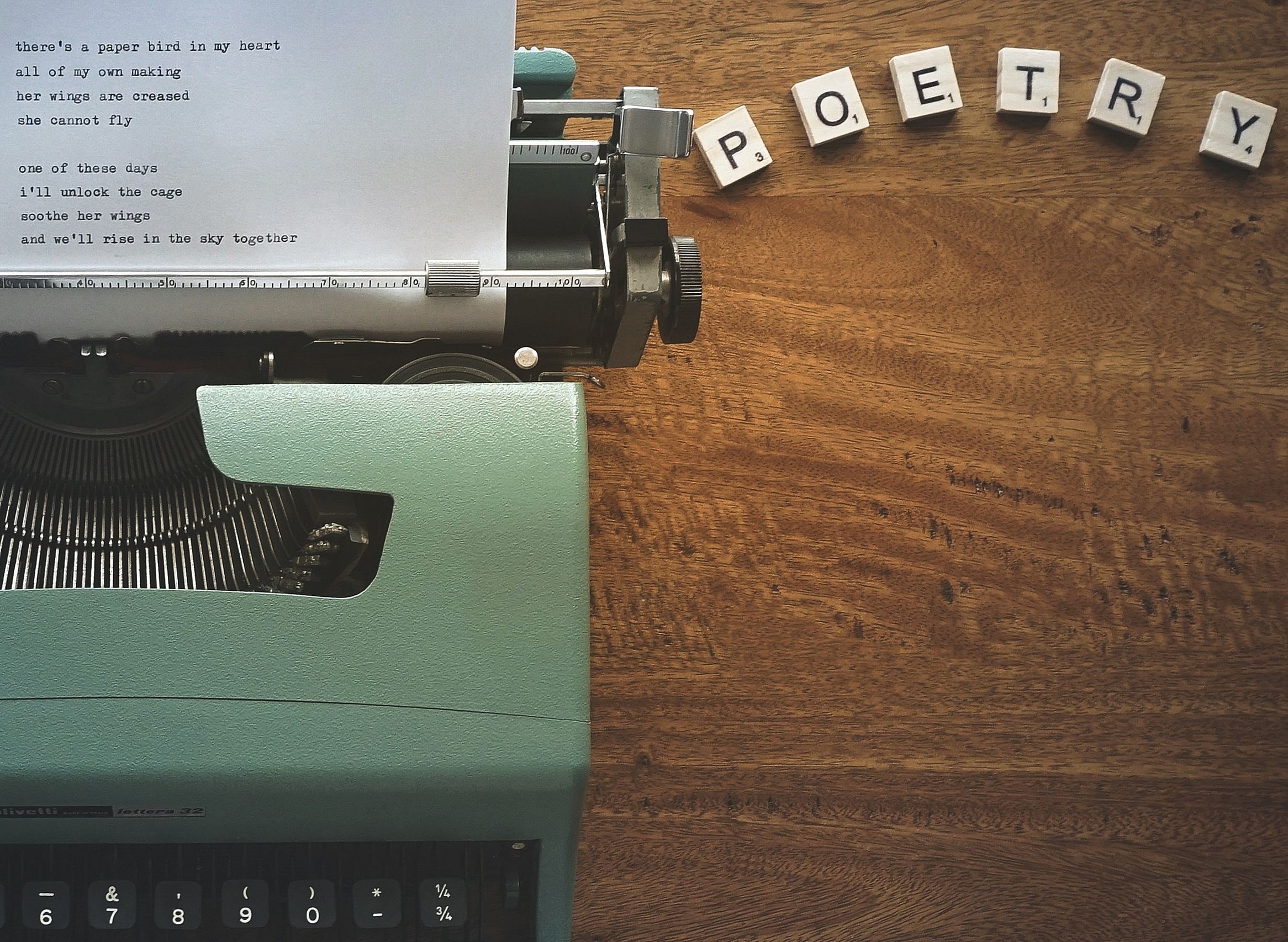 Vintage typewriter and letters on wooden table